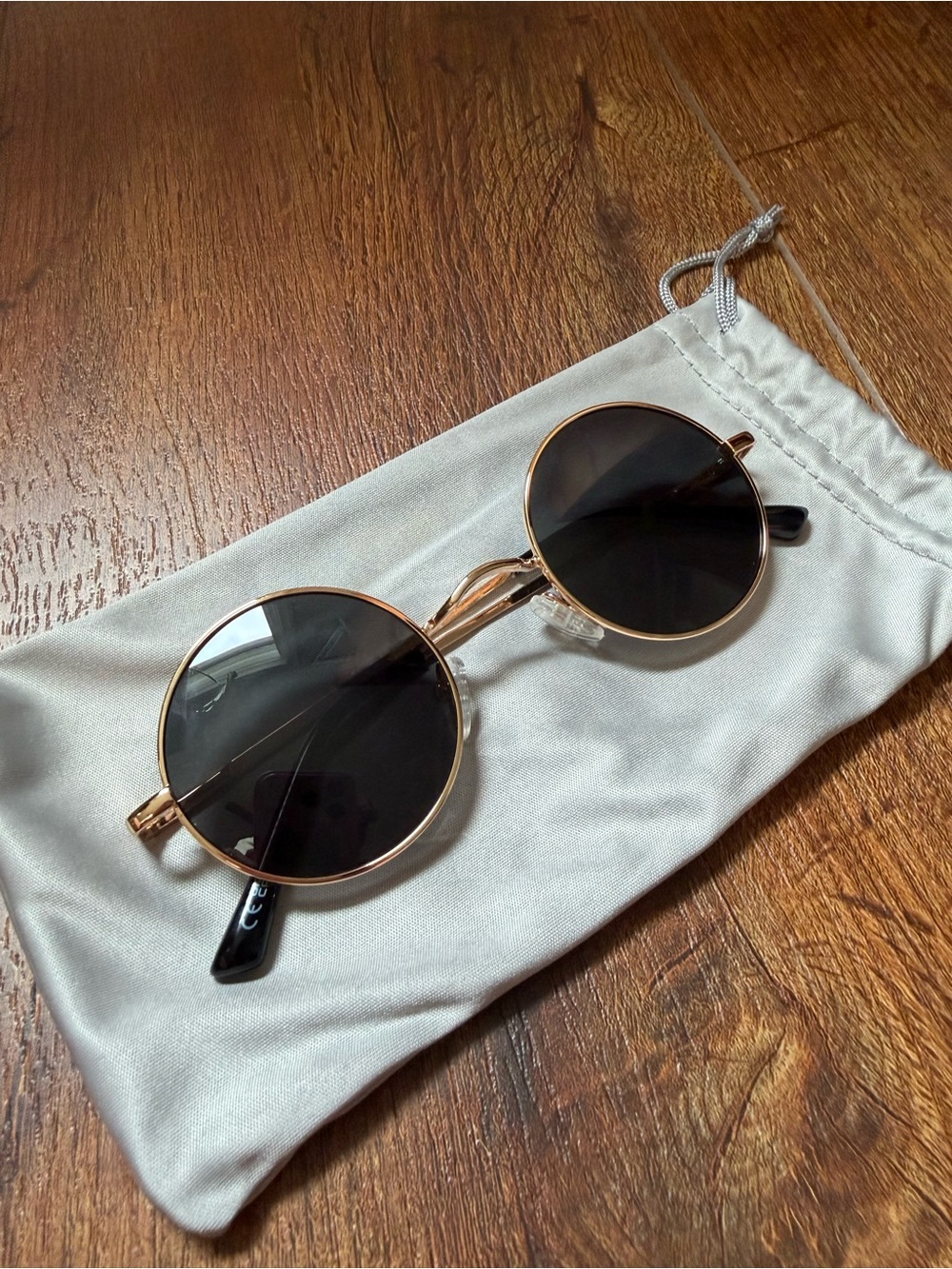 Round Metal Frame Sunglasses in Gold with Black Lenses